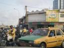 Cotonou Taxi  This is in front of the pickup - just part of driving in Cotonou