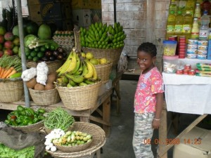 A girl at the vegetable market