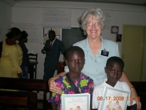 Obed and Pacome with New Primary song books