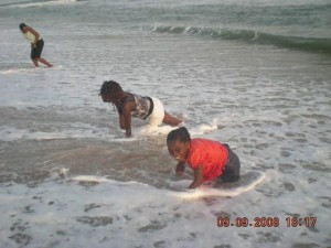 Scholastic and Deborah in the Surf