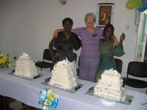The cake maker and some assistants